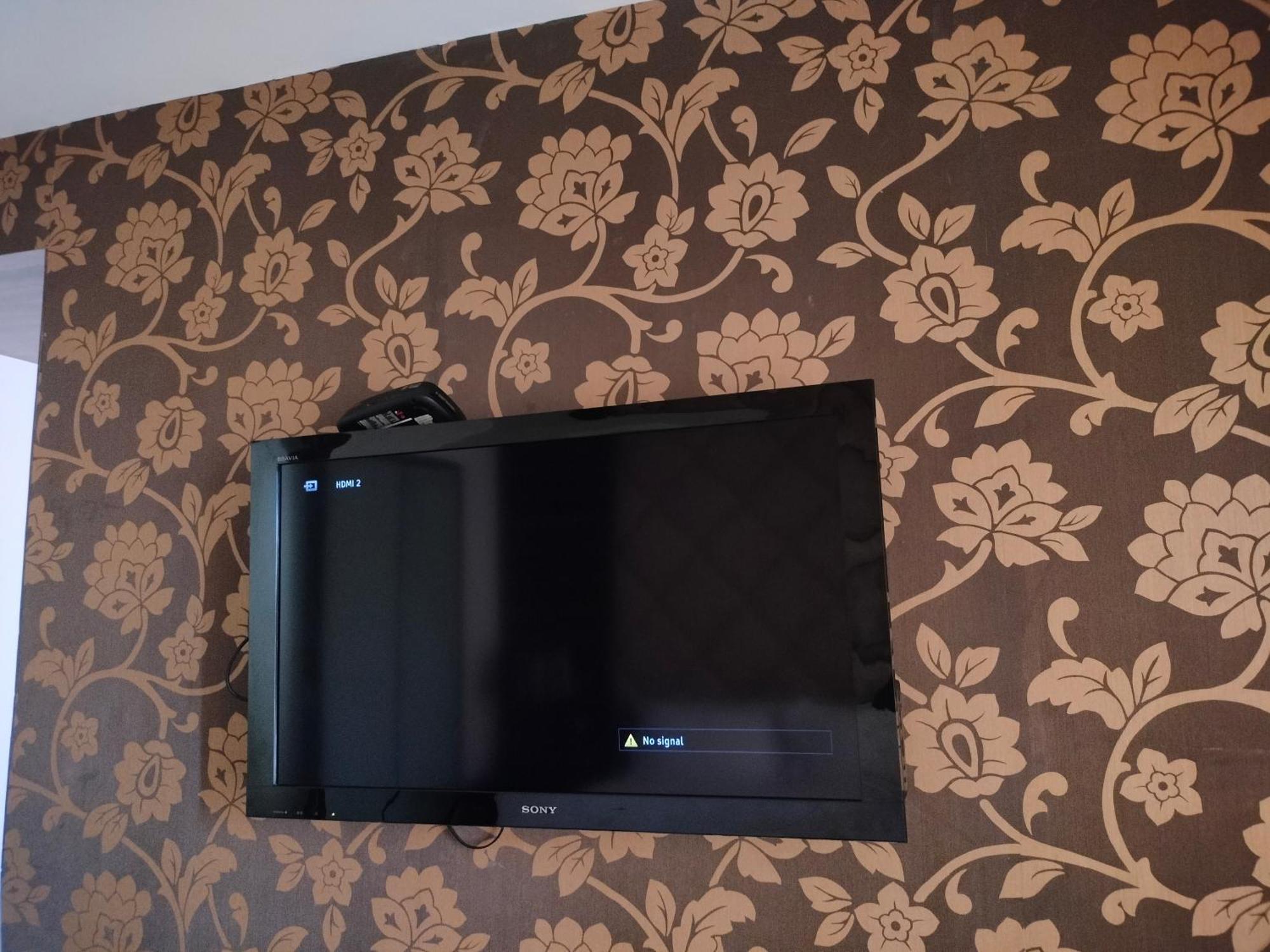 Holiday Inn Chandigarh Panchkula Exterior foto A television mounted on a wall